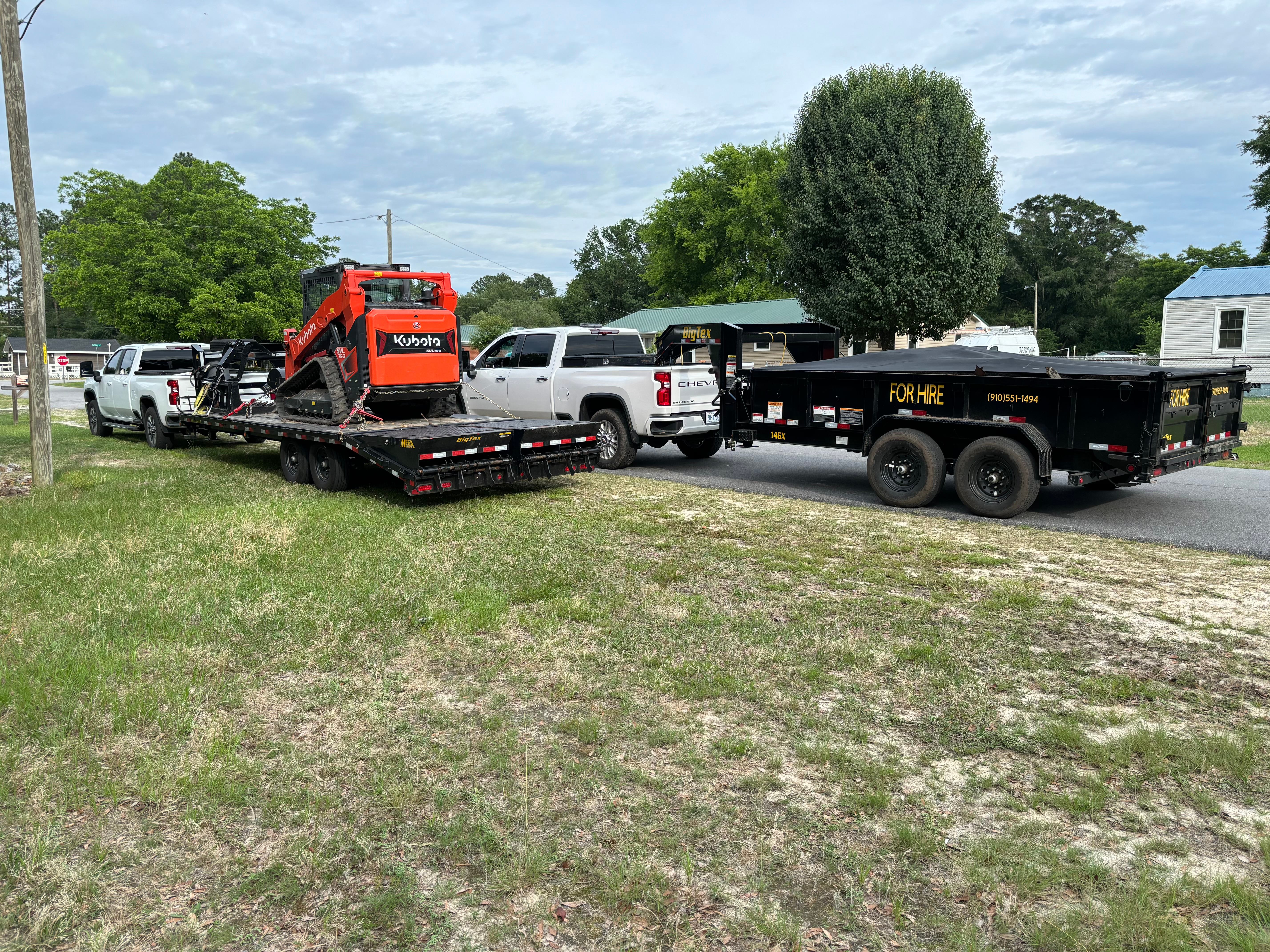 Heavy equipment hauling services by Carolina Land Works & Hauling